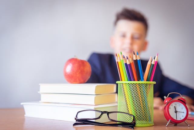 School supplies with apple